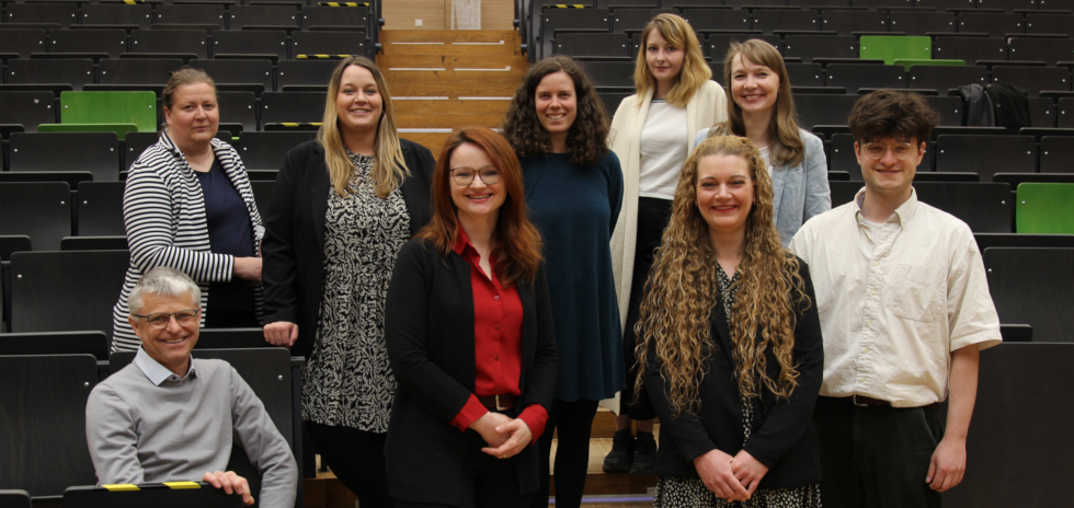 Teamfoto im Hörsaal 6